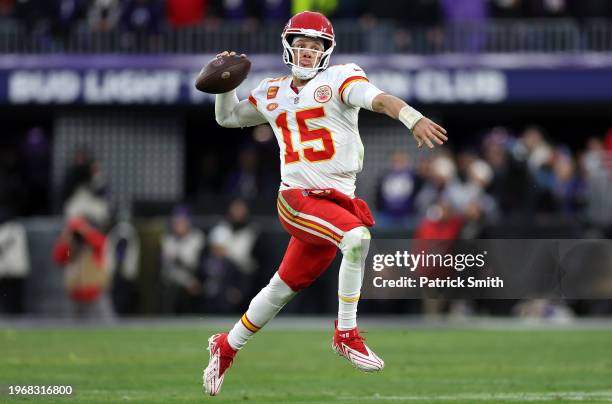 Patrick Mahomes of the Kansas City Chiefs looks to pass against the Baltimore Ravens during the second quarter in the AFC Championship Game at M&T...