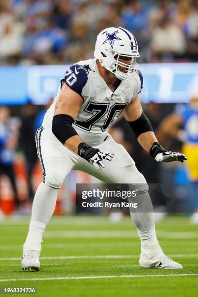 Zack Martin of the Dallas Cowboys blocks during an NFL football game against the Los Angeles Chargers at SoFi Stadium on October 16, 2023 in...