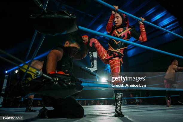 Malaysian wrestler Nor ‘Phoenix’ Diana competes in the ring during the APAC Wrestling Championship Royal Rumble on January 28 in Puchong, Selangor,...