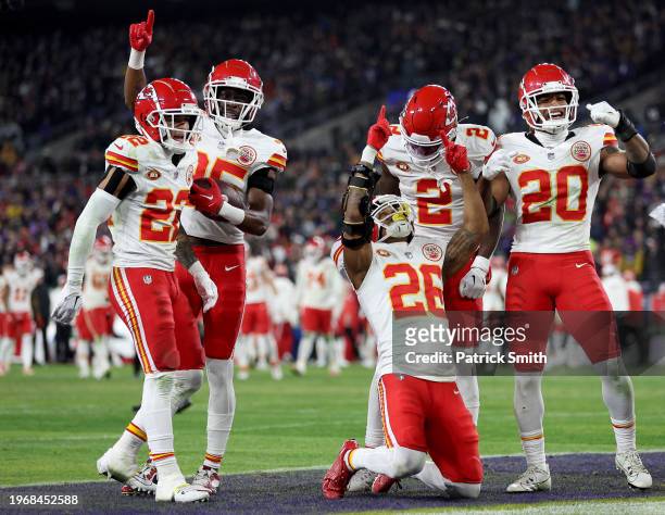 Deon Bush of the Kansas City Chiefs celebrates with teammates after an interception against the Baltimore Ravens during the fourth quarter in the AFC...