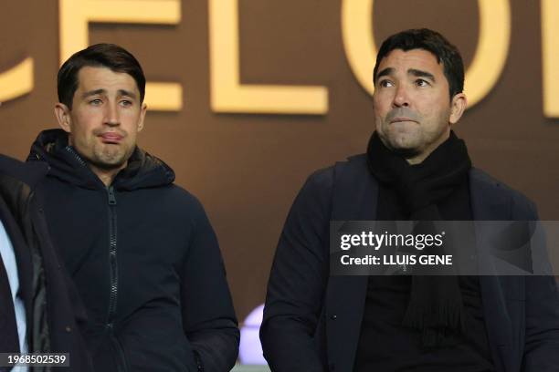 Former footballer Bojan Krkic and Barcelona's Sports Director Anderson de Souza Deco wait for the start of the the Spanish league football match...