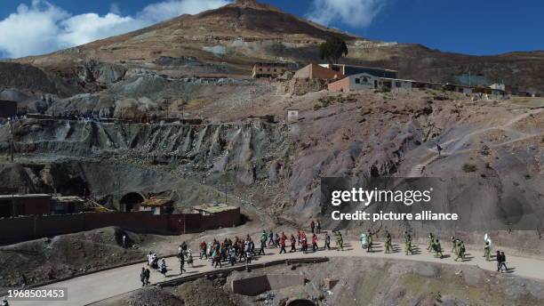 January 2024, Bolivia, Potosi: A carnival parade passes in front of the Pailaviri silver mine on Cerro Rico . Photo: Alexis Demarco/dpa