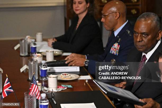 Secretary of Defense Lloyd Austin looks on during opening remarks at a meeting with Britain's Secretary of Defense Grant Shapps at the Pentagon in...