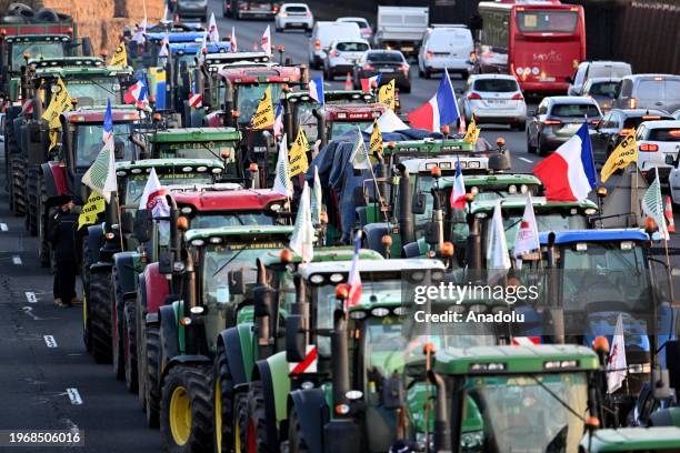 French farmers are blocked by the French gendarmerie armoured personnel as they arrive to protest on A6 motorway near Chilly-Mazarin, south of Paris,...