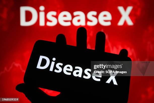 In this photo illustration, the Disease X words is seen on a smartphone screen. Disease X is name given by scientists and the World Health...