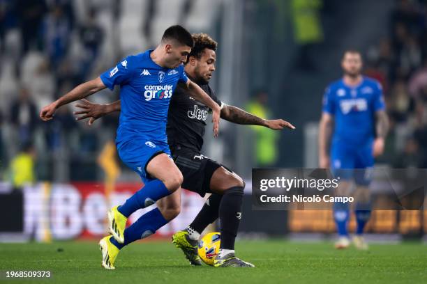 Weston McKennie of Juventus FC competes for the ball with Nicolo Cambiaghi of Empoli FC during the Serie A football match between Juventus FC and...