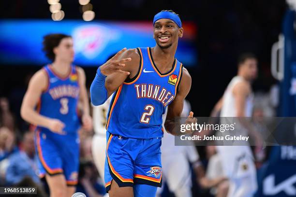 Shai Gilgeous-Alexander of the Oklahoma City Thunder gestures to the crowd after a basket during the second half against the Denver Nuggets at Paycom...