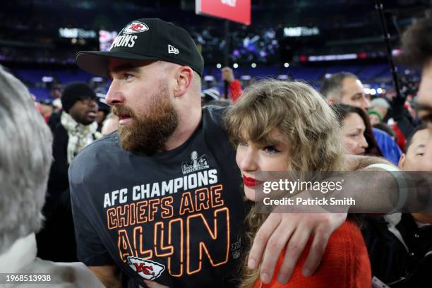 Travis Kelce of the Kansas City Chiefs celebrates with Taylor Swift after a 17-10 victory against the Baltimore Ravens in the AFC Championship Game...