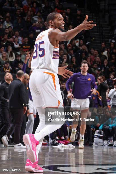 Kevin Durant of the Phoenix Suns celebrates three point basket during the game against the Brooklyn Nets on January 31, 2024 at Barclays Center in...