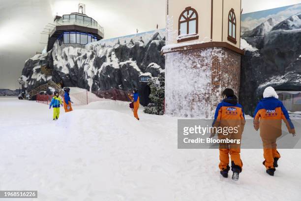 Visitors at the Karoo Ice and Snow World indoor ski facility in Shenzhen, China, on Saturday, Jan. 20, 2024. Hong Kong's efforts to revive its ailing...