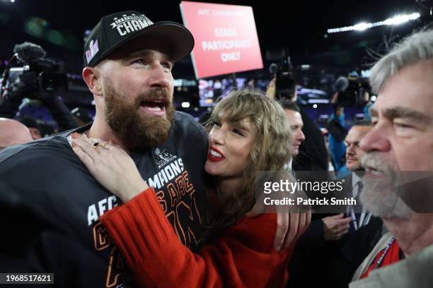 Travis Kelce of the Kansas City Chiefs celebrates with Taylor Swift after a 17-10 victory against the Baltimore Ravens in the AFC Championship Game...
