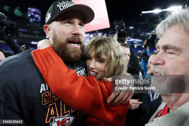 Travis Kelce of the Kansas City Chiefs celebrates with Taylor Swift after a 17-10 victory against the Baltimore Ravens in the AFC Championship Game...