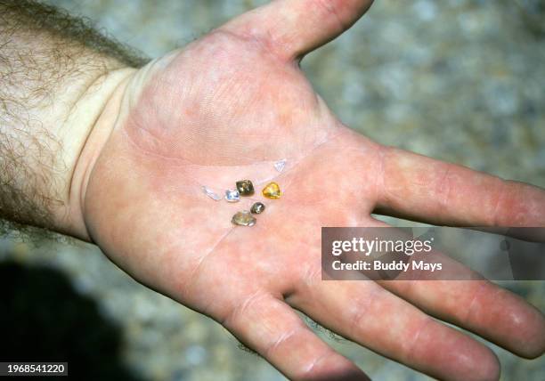 Handful of real diamonds found at Crater of Diamonds State Park near Murfreesboro, in southern Arkansas, 1995. .