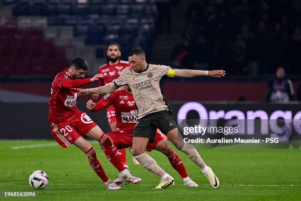 Kylian Mbappe of Paris Saint-Germain fights for possession during the Ligue 1 Uber Eats match between Paris Saint-Germain and Stade Brestois 29 at...