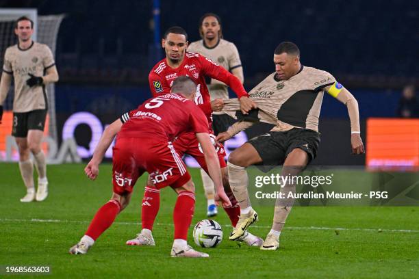 Kylian Mbappe of Paris Saint-Germain fights for possession during the Ligue 1 Uber Eats match between Paris Saint-Germain and Stade Brestois 29 at...