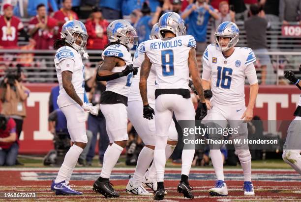 Jahmyr Gibbs of the Detroit Lions celebrates with teammates after scoring a touchdown during the second quarter against the San Francisco 49ers in...