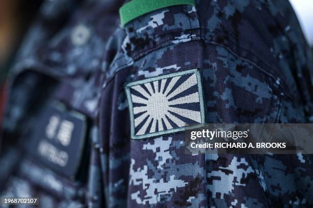 Crew member is seen on the bridge of the Japan Maritime Self-Defense Force's Hyuga-class helicopter destroyer "JS Ise" during a three-day maritime...