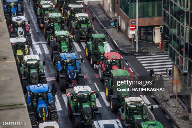 This photograph taken on February 1 shows rows of tractors between buildings in the Belliard street during a protest action in the European district...