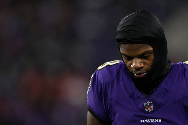 Lamar Jackson of the Baltimore Ravens reacts during the fourth quarter against the Kansas City Chiefs in the AFC Championship Game at M&T Bank...