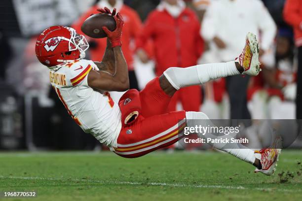 Marquez Valdes-Scantling of the Kansas City Chiefs makes a catch against the Baltimore Ravens during the fourth quarter of the AFC Championship Game...