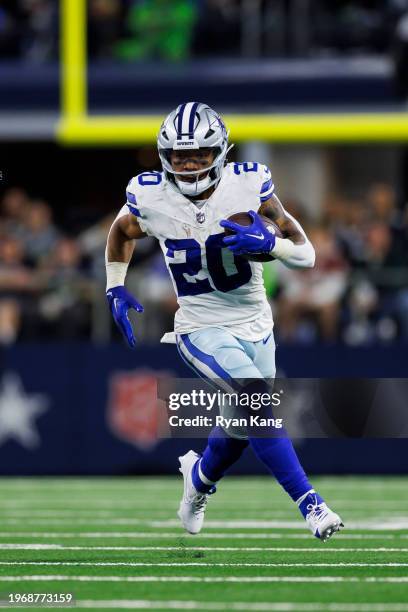 Tony Pollard of the Dallas Cowboys carries the ball on a run play during an NFL football game against the Seattle Seahawks at AT&T Stadium on...