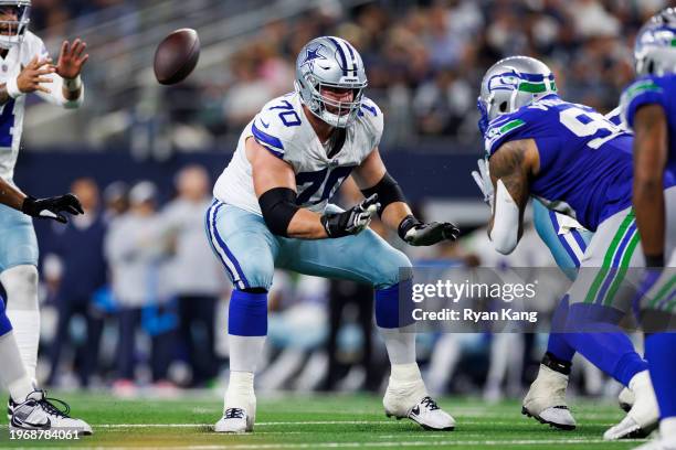 Zack Martin of the Dallas Cowboys blocks during an NFL football game against the Seattle Seahawks at AT&T Stadium on November 30, 2023 in Arlington,...