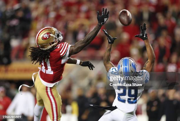 Kindle Vildor of the Detroit Lions attempts to intercept a pass intended for Brandon Aiyuk of the San Francisco 49ers during the third quarter in the...