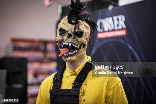Masked visitor during The NAMM Show at Anaheim Convention Center on January 28, 2024 in Anaheim, California.