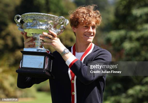 Jannik Sinner of Italy poses with the Norman Brookes Challenge Cup after winning the 2024 Australian Open Final, at Royal Botanic Gardens on January...