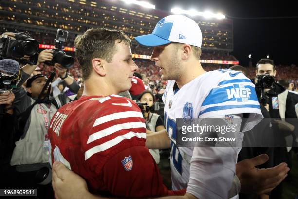 Brock Purdy of the San Francisco 49ers shakes hands with Jared Goff of the Detroit Lions following the NFC Championship Game at Levi's Stadium on...