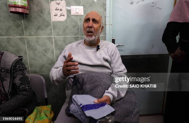 Palestinian man, who was released after being detained with other civilians for questioning by Israeli forces amid the ongoing conflict between...