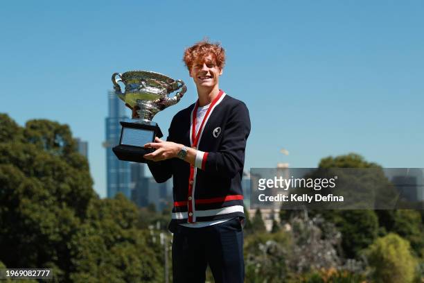 Jannik Sinner of Italy poses with the Norman Brookes Challenge Cup after winning the 2024 Australian Open Final, at Royal Botanic Gardens on January...