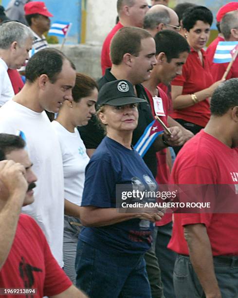 Dalia Soto del Valle , the wife of Cuban President Fidel Castro, walks during a protest in La Habana, 12 June 2002 against US President Bush's speech...