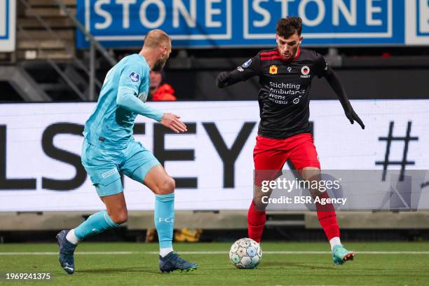 Troy Parrott of Excelsior Rotterdam is challenged by Mike van der Hoorn of FC Utrecht during the Dutch Eredivisie match between Excelsior Rotterdam...