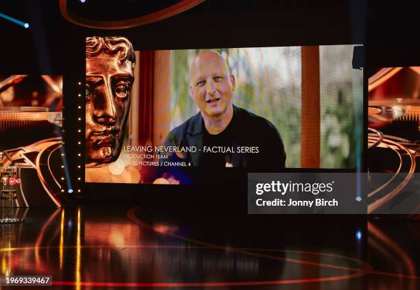 Dan Reed accepts the Factual Series award for Leaving Neverland