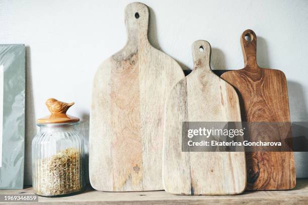 close-up of worn wooden cutting boards - tagliere foto e immagini stock
