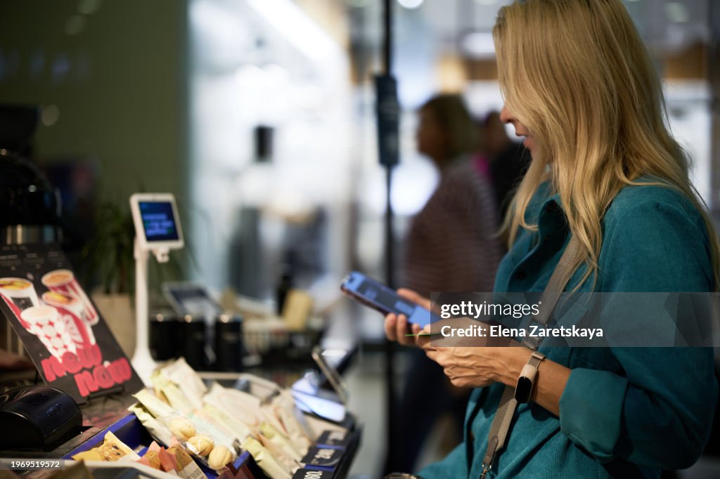 Woman making card payment