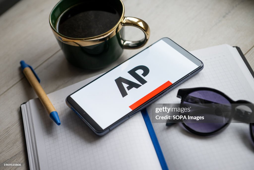 In Ap In this photo illustration an AP, Associated Press logo seen... News ...