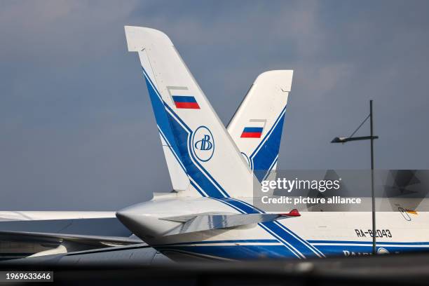 February 2024, Saxony, Schkeuditz: Two Antonov An-124 cargo planes from the Russian Volga-Dnepr Group are parked at Leipzig/Halle Airport. The planes...