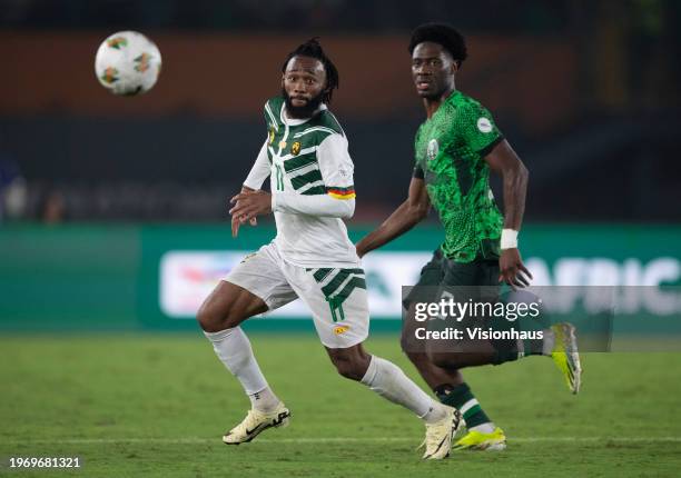 Georges Nkoudou of Cameroon and Ola Aina of Nigeria during the Total Energies CAF Africa Cup of Nations round of 16 match between Nigeria and...