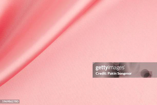 pink color fabric cloth polyester texture and textile background. - pink jersey bildbanksfoton och bilder