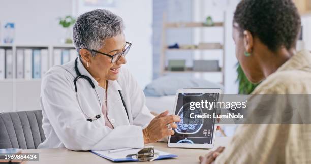 healthcare, tablet for brain scan and doctor with patient at appointment or checkup for diagnosis. medicine, consulting or mri results with medical professional and woman in hospital for discussion - mr brain stock pictures, royalty-free photos & images