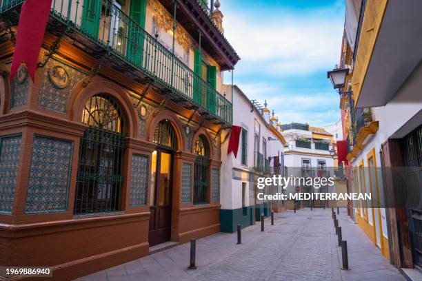 triana barrio of sevilla seville at sunset in andalusia spain - sevilha imagens e fotografias de stock