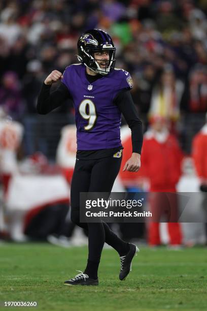 Justin Tucker of the Baltimore Ravens celebrates a fourth quarter field goal against the Kansas City Chiefs in the AFC Championship Game at M&T Bank...