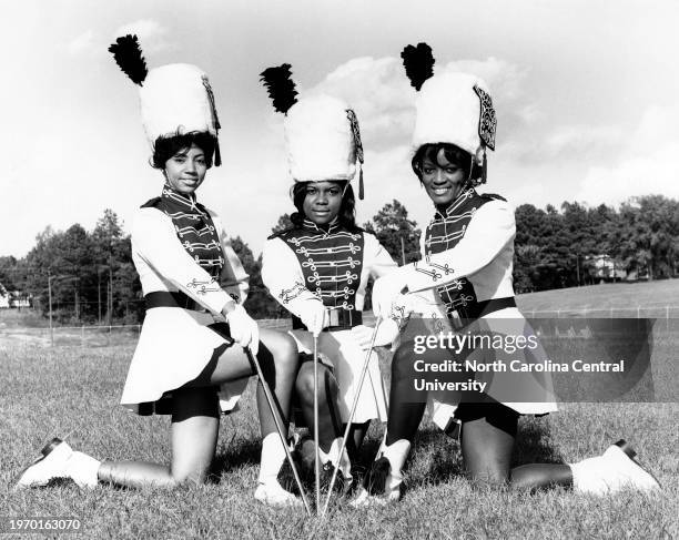 North Carolina College Majorettes pose for photograph dressed in uniform on campus in Durham, North Carolina.