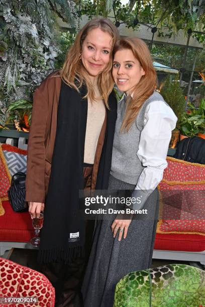 Poppy Jamie and Princess Beatrice of York attend Poppy Delevingne's Della Vite Valentine's lunch at The Ivy Chelsea Garden on February 1, 2024 in...