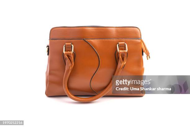 women's handbag isolated on white background. - brown purse stock-fotos und bilder