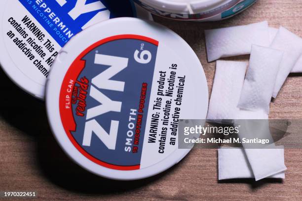 In this photo illustration, ZYN nicotine cases and pouches are seen on a table on January 29, 2024 in New York City. Sen. Chuck Schumer is calling...