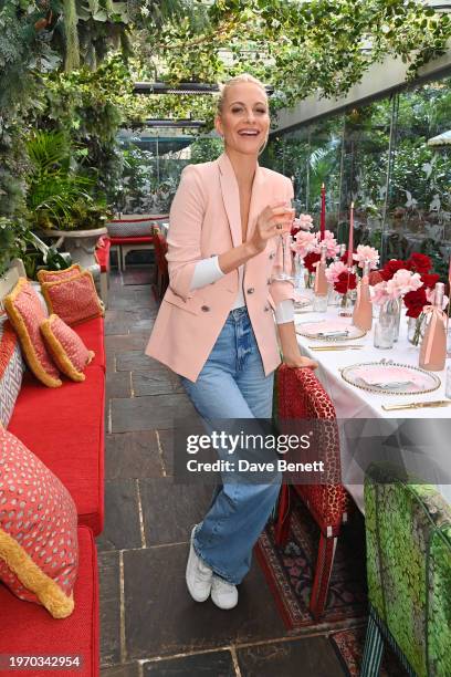 Poppy Delevingne attends Poppy Delevingne's Della Vite Valentine's lunch at The Ivy Chelsea Garden on February 1, 2024 in London, England.