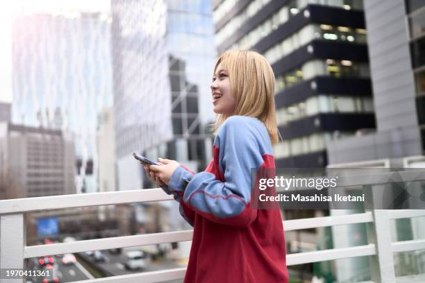 connectivity- individuals with digital devices - 渋谷 stock pictures, royalty-free photos & images